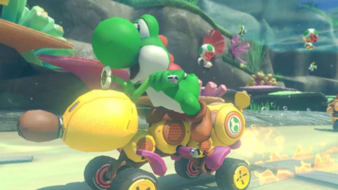 Yoshi auf dem Wilden Wiggler in Mario Kart 8.