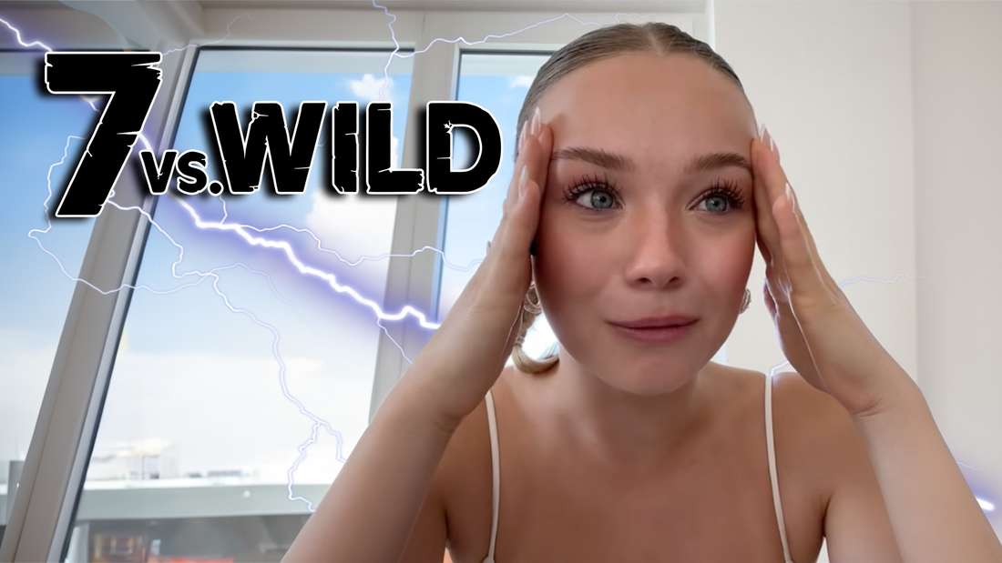 Julia Beautx neben einem 7 vs. Wild Logo und einem Blitz.